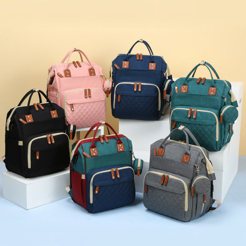 2-in-1 Baby Rucksack mit integriertem Wickelbett
