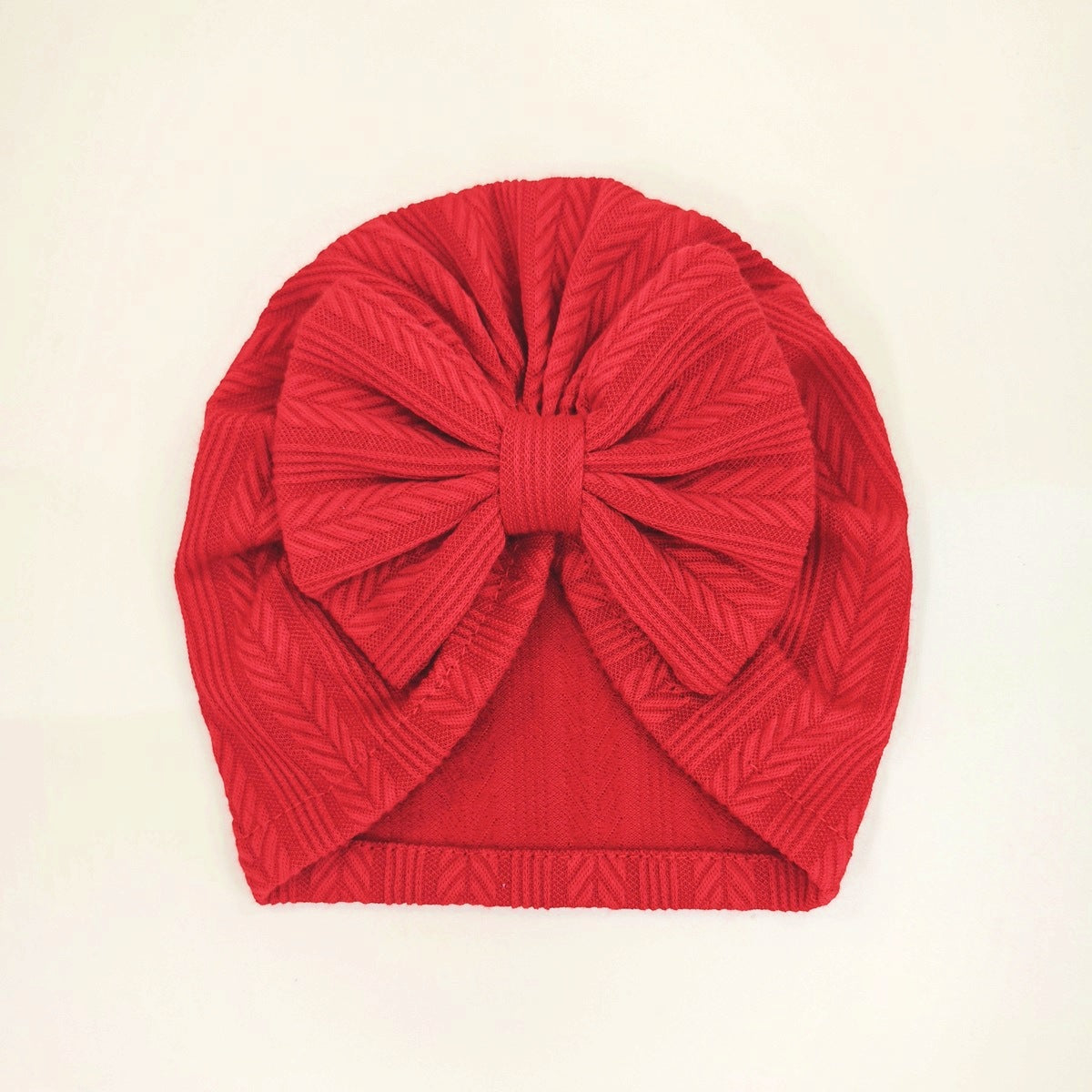 Geraffter Baby-Turban mit Schleife – Weiche Strickmütze für Neugeborene